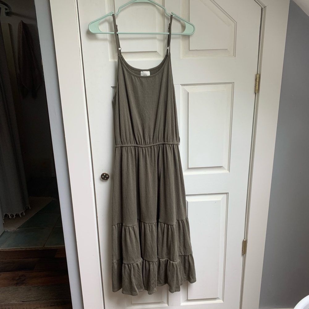 Olive colored long midi dress.